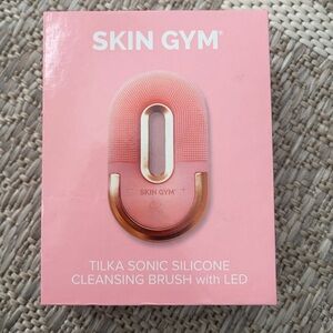 Skin Gym Tilka Sonic Silicone Cleansing Brush with LED. New in box. Never used.